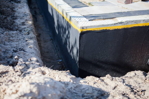 Professional Interior Drainage System technician working in Whitehall, WI